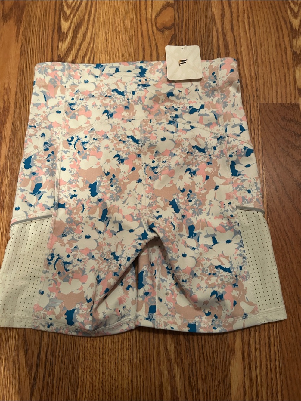 Fabletics High-Rise Pastel Camouflage Bike Shorts in Blue and Pink - Picture 7 of 11